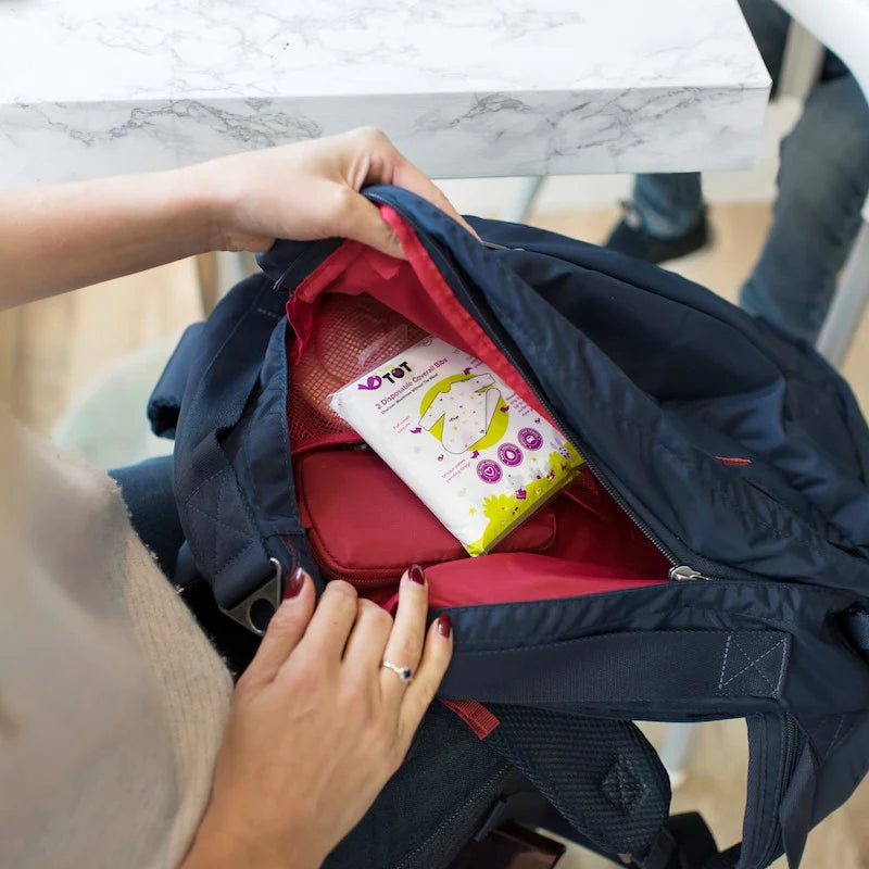 Tidy Tot Disposable Coverall Bib in use