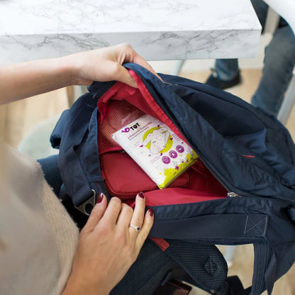 Tidy Tot Disposable Coverall Bib in use