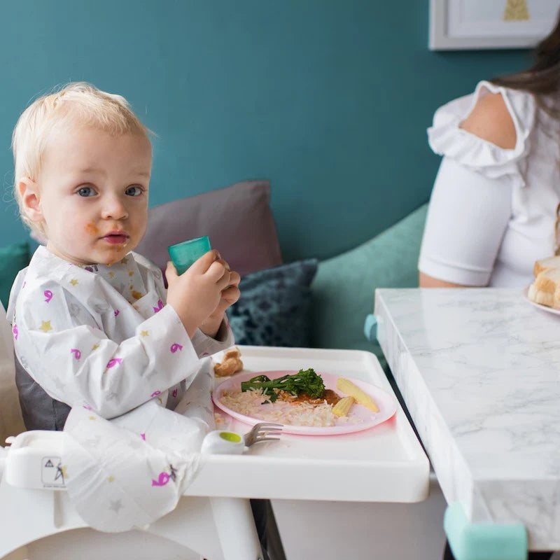 Tidy Tot Disposable Coverall Bib — full coverage