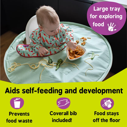 Baby using the Tidy Tot Bib & Tray Kit at mealtime