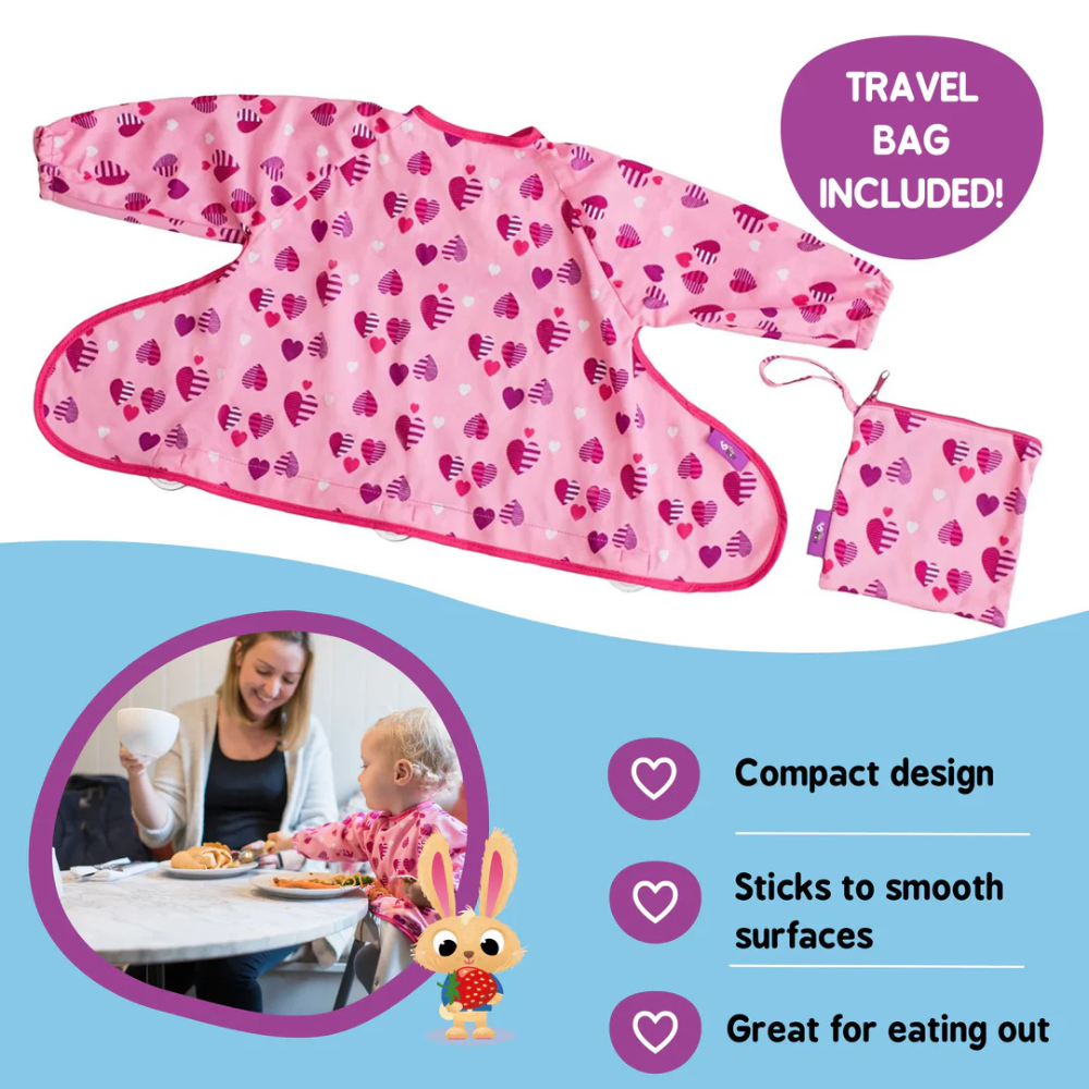 Tidy Tot Cover & Catch Bib with suction cups on the highchair